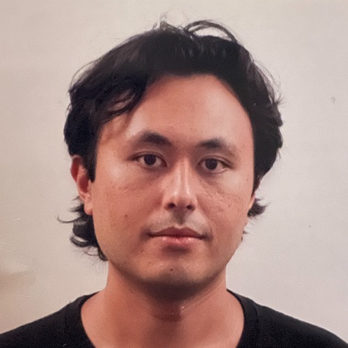 Photo of Patrick Matherly in front of a light background