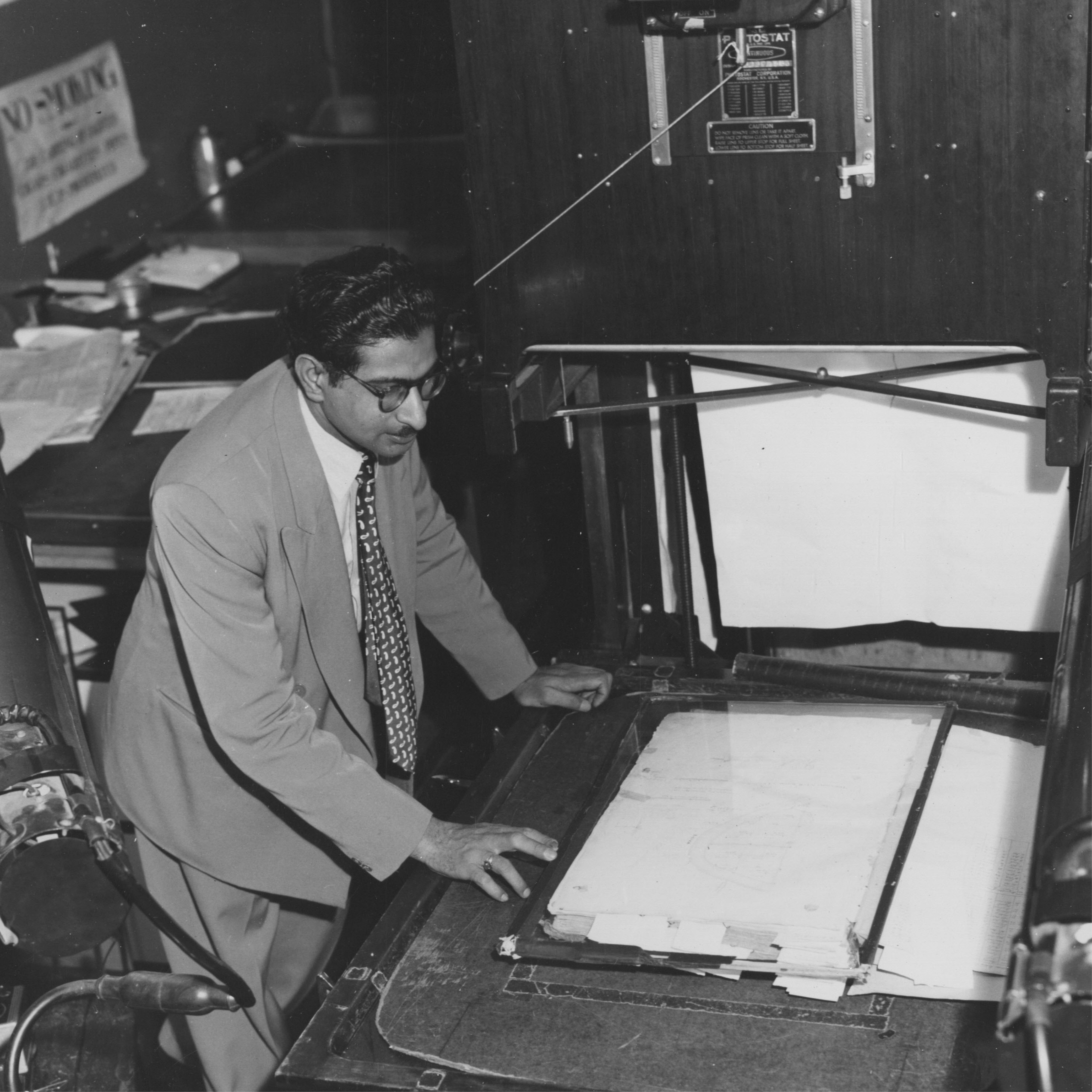 Photograph of Mr. M. Siddiq at Photostat Machine (1954). US National Archives.