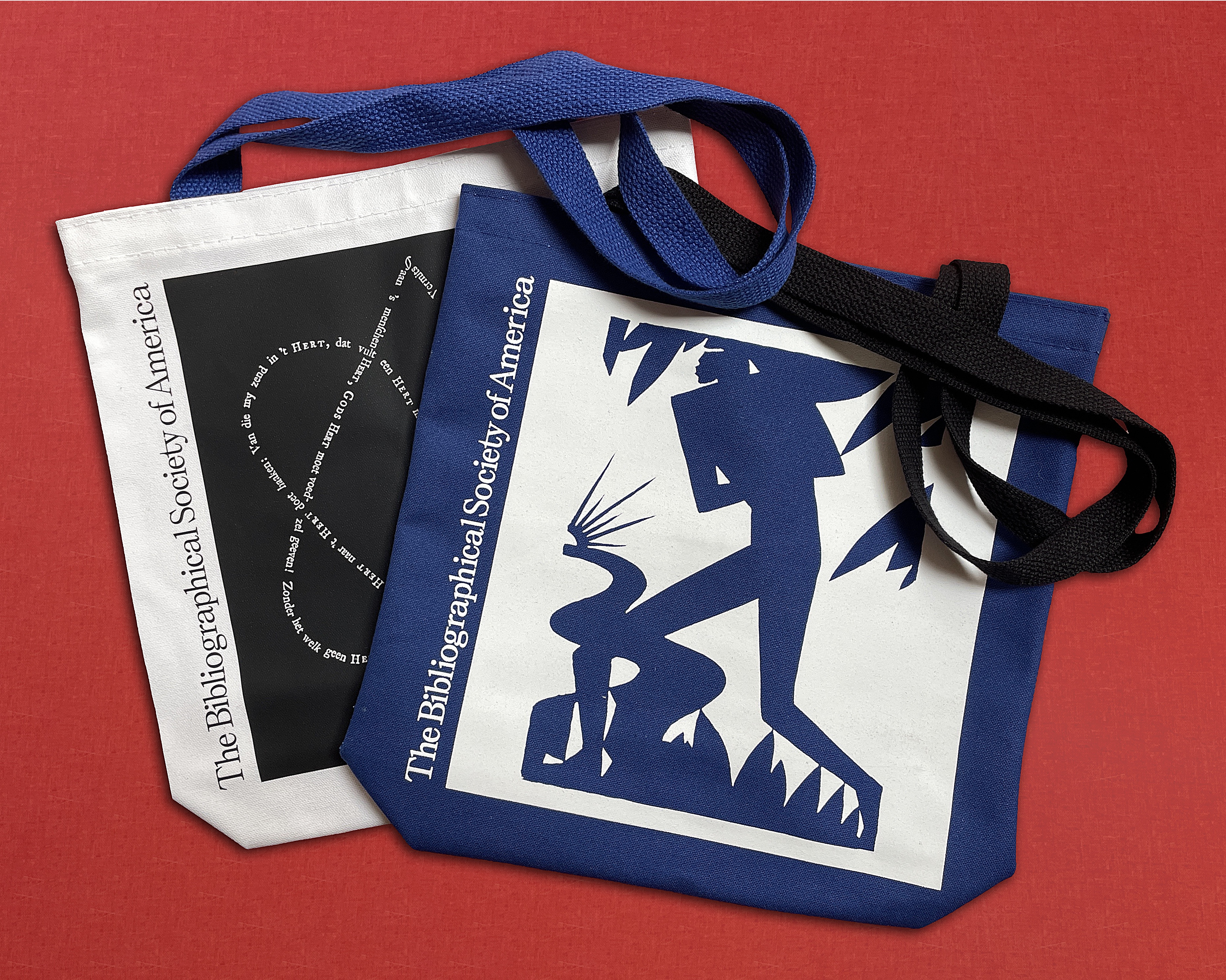 Black and white image of two overlapping tote bags with